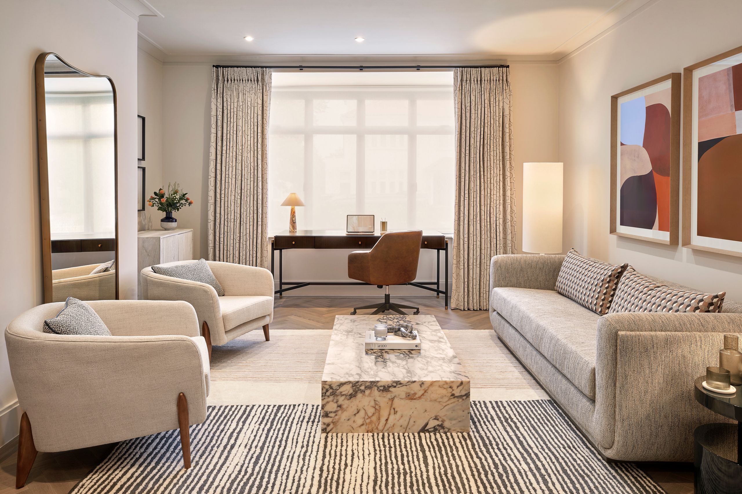 Image may contain: Home Decor, Chair, Furniture, Table, Coffee Table, Architecture, Building, Indoors, Living Room, and Room