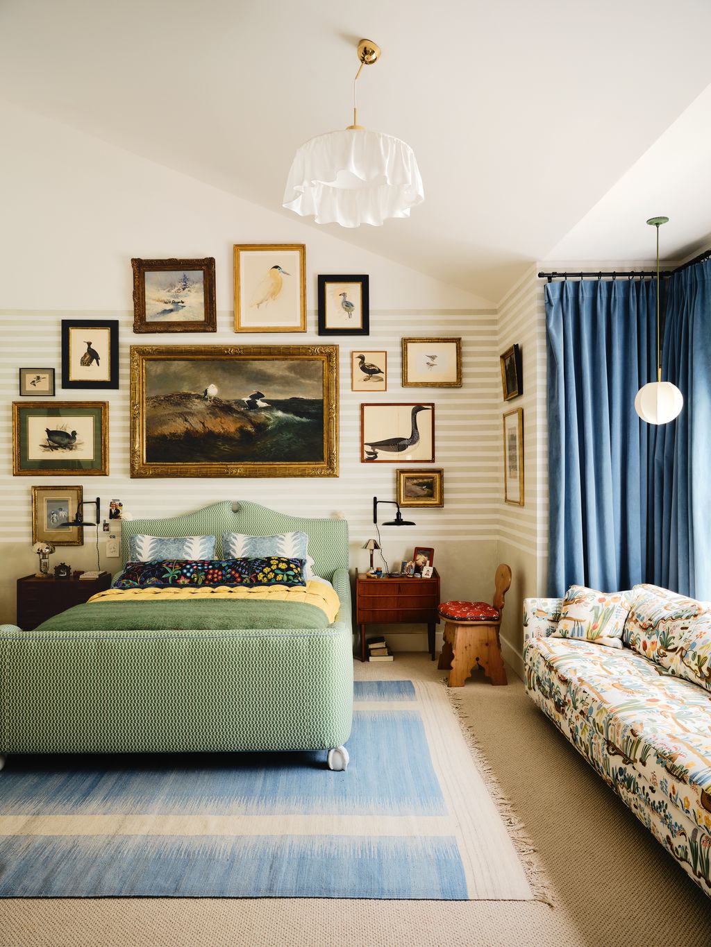 Image may contain Home Decor Lamp Bed Furniture Chair Couch Rug Art Painting Indoors Interior Design and Bedroom