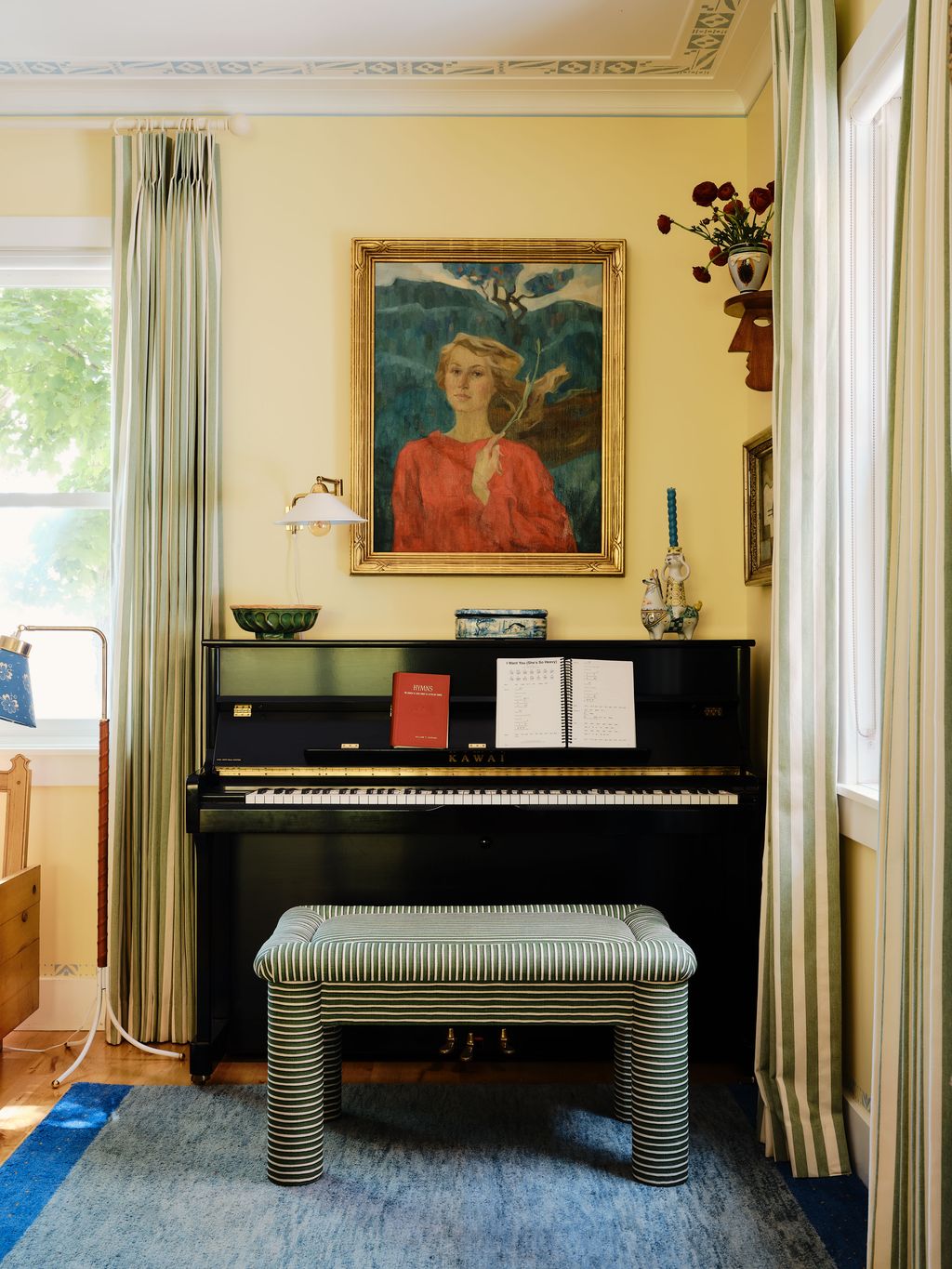 Image may contain Keyboard Musical Instrument Piano Art Painting Home Decor Rug Book Publication Adult and Person