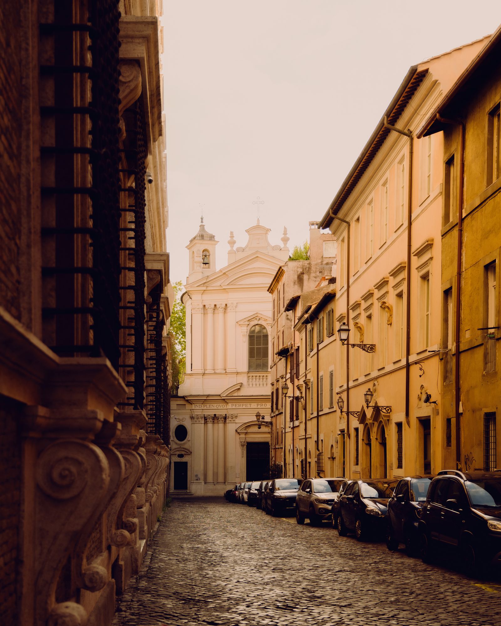 Image may contain City Road Street Urban Alley Path Lamp Car Transportation Vehicle Arch and Architecture