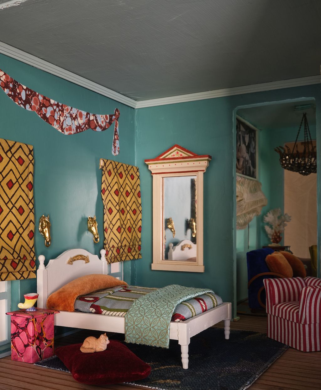 Image may contain Home Decor Bed Furniture Corner Rug Couch Cushion Lamp Bedroom Indoors Room Animal and Cat