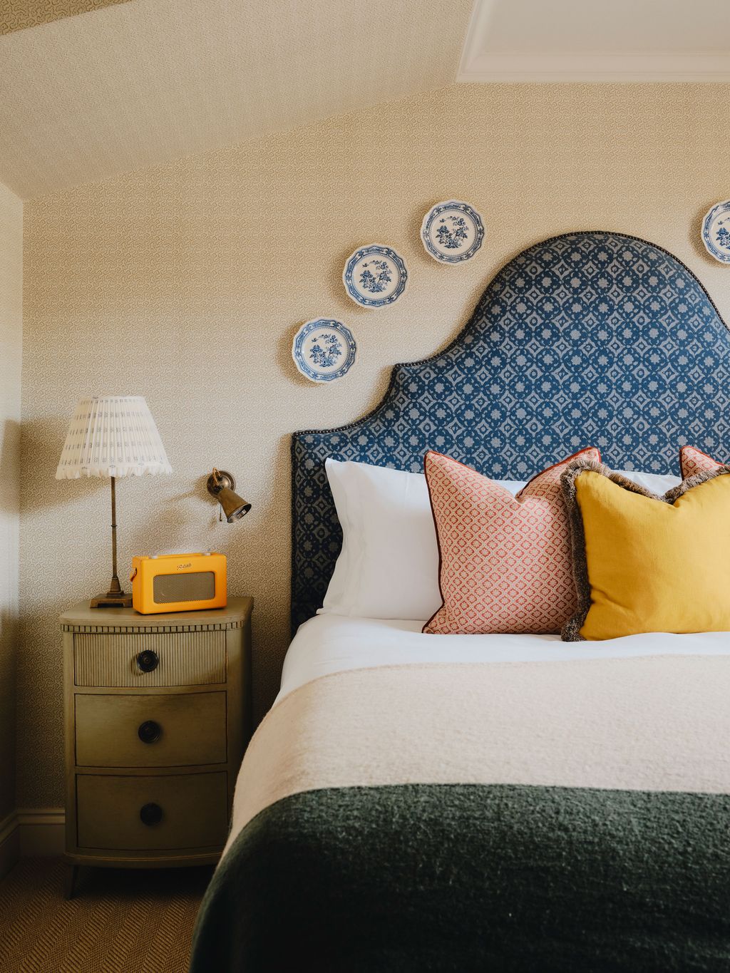 Image may contain Cushion Home Decor Lamp Bed Furniture Plate Pillow Bedroom Indoors Room and Interior Design