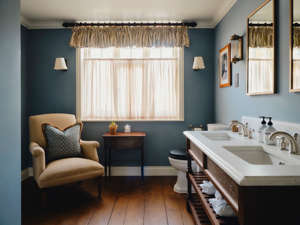 Image may contain Lamp Chair Furniture Plant Sink Sink Faucet Art Painting Home Decor Desk Table and Indoors