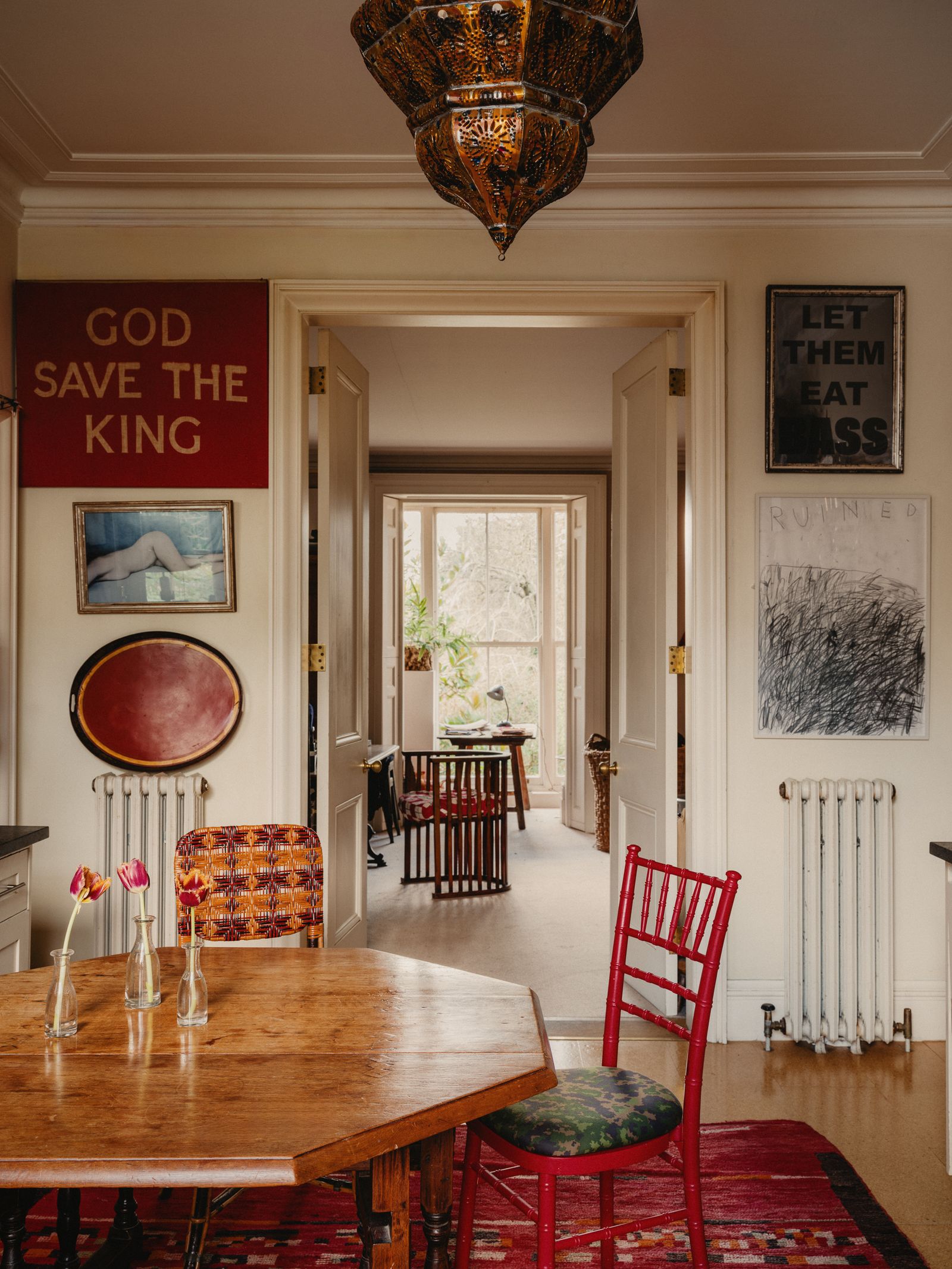 Image may contain Architecture Building Dining Room Dining Table Furniture Indoors Room Table and Chair