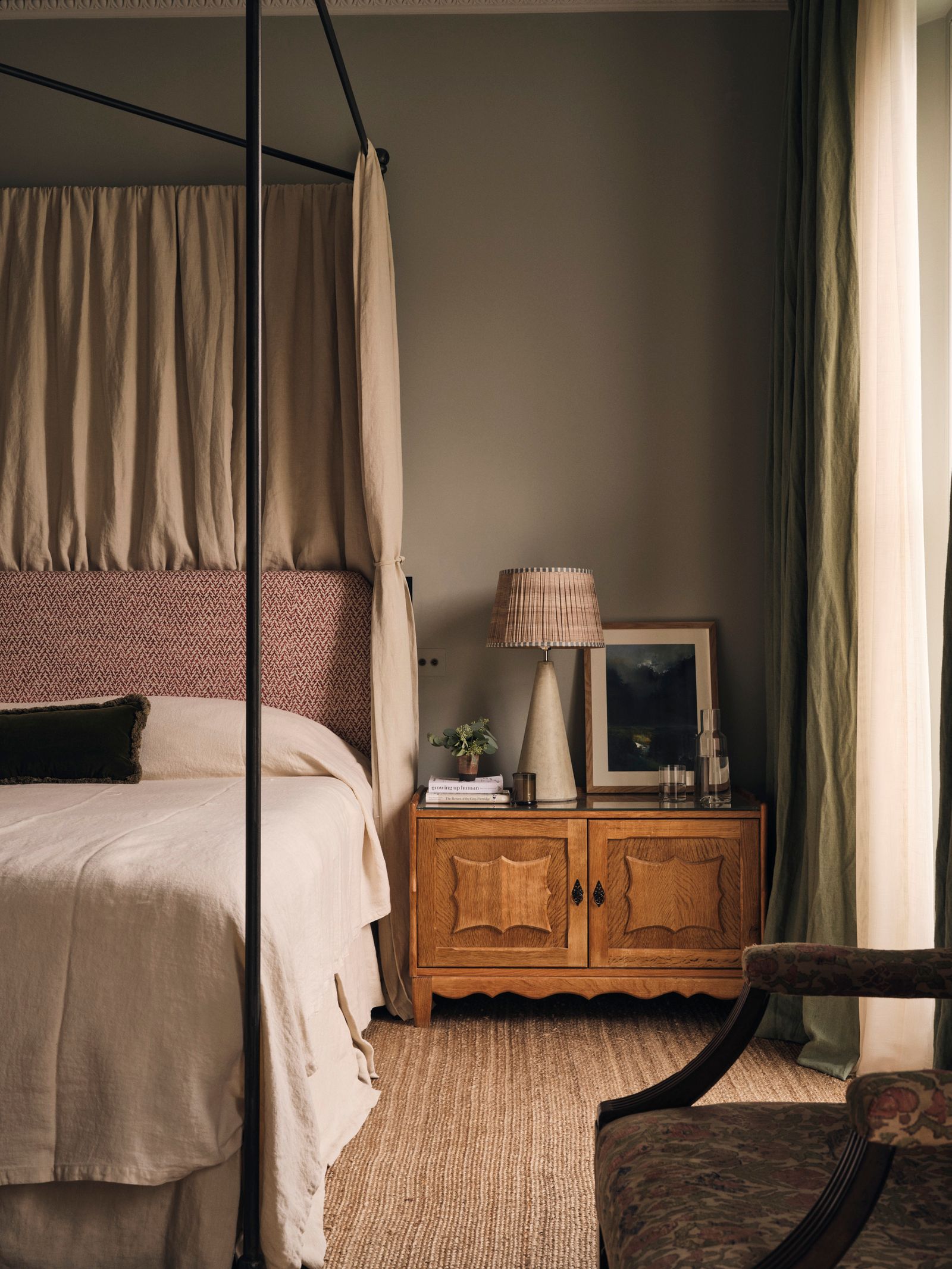 Image may contain Furniture Bed Bedroom Indoors Room Lamp Art Painting Chair Plant Cup and Canopy Bed