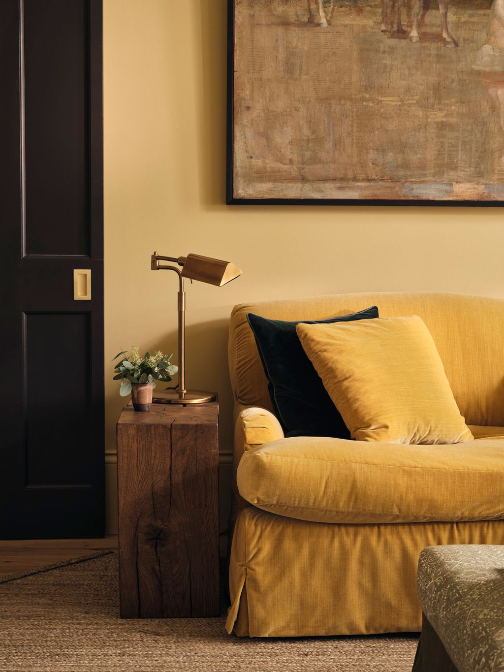 Image may contain Lamp Couch Furniture Indoors Interior Design and Floor Lamp