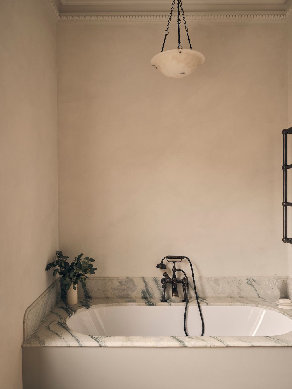 Image may contain Bathing Lamp Plant Bathtub Person Tub Indoors and Interior Design