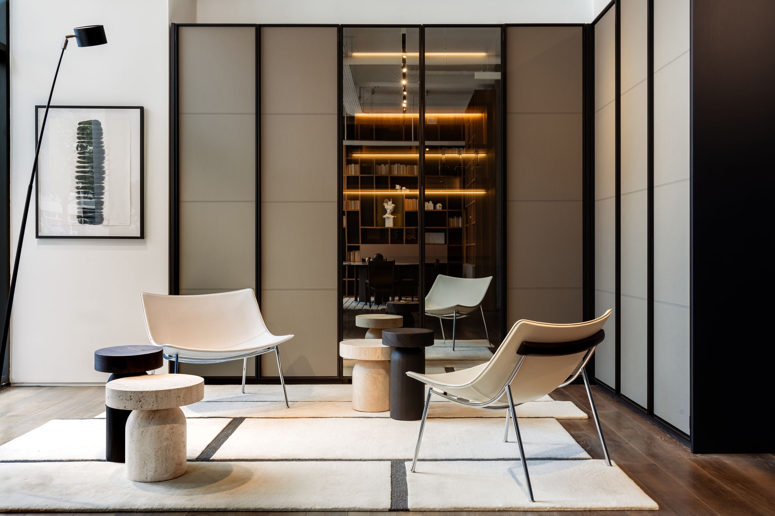 Image may contain: Indoors, Interior Design, Chair, Furniture, Home Decor, Person, Rug, Architecture, and Building