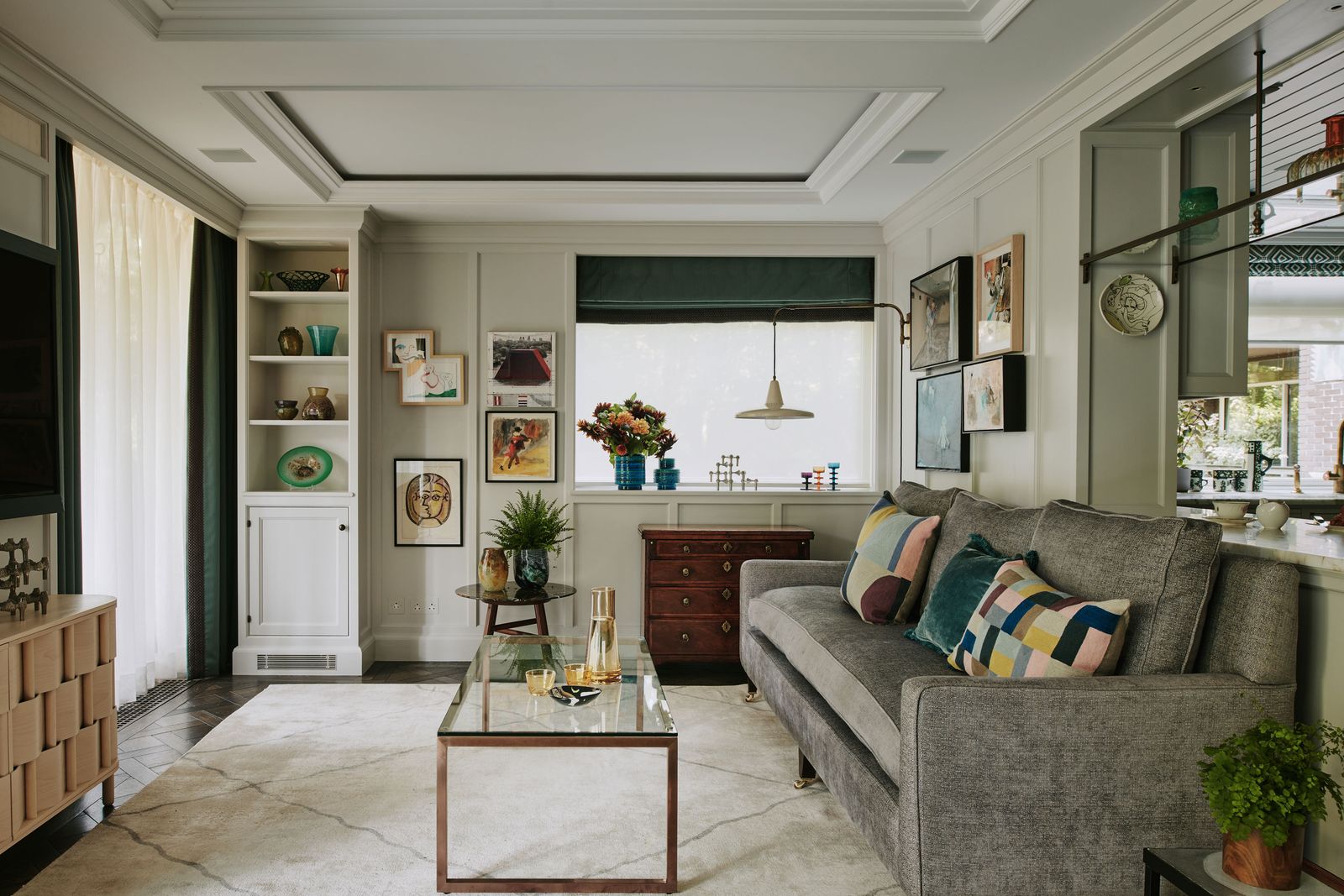 Image may contain Home Decor Plant Couch Furniture Architecture Building Indoors Living Room Room and Table