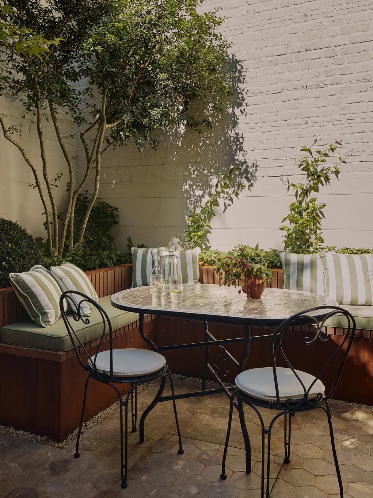 Image may contain Furniture Table Dining Table Indoors Interior Design Chair Tabletop Backyard Nature and Outdoors