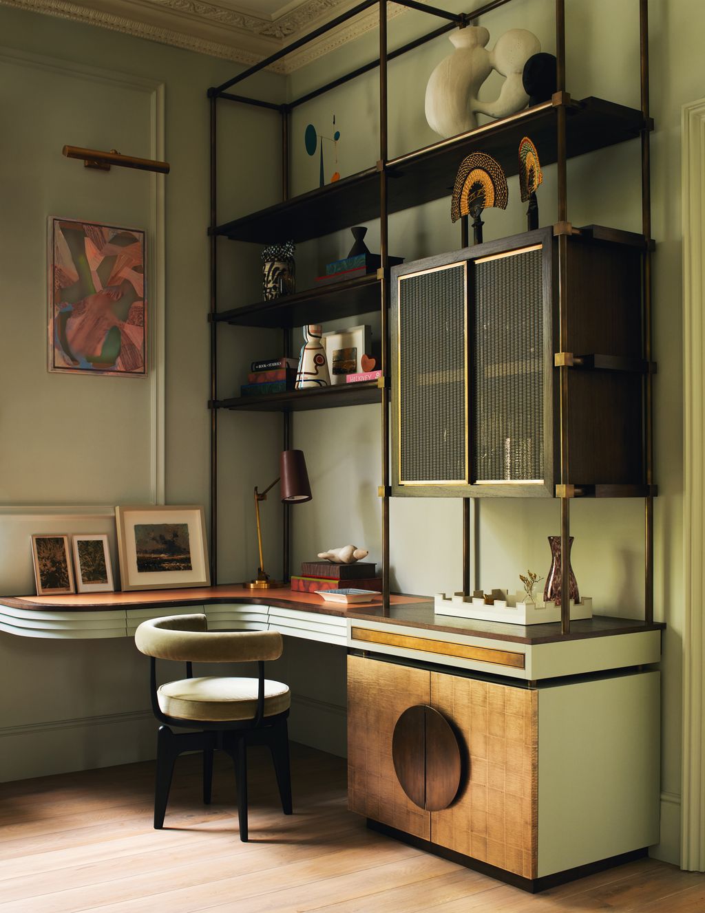 Image may contain Corner Indoors Interior Design Lamp Chair Furniture Table Art Painting Book and Publication