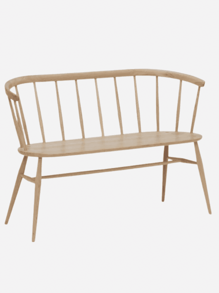 Image may contain: Bench, Furniture, Crib, and Infant Bed