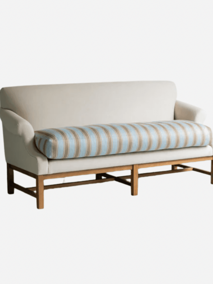 Image may contain: Couch, Furniture, Cushion, Home Decor, and Bench