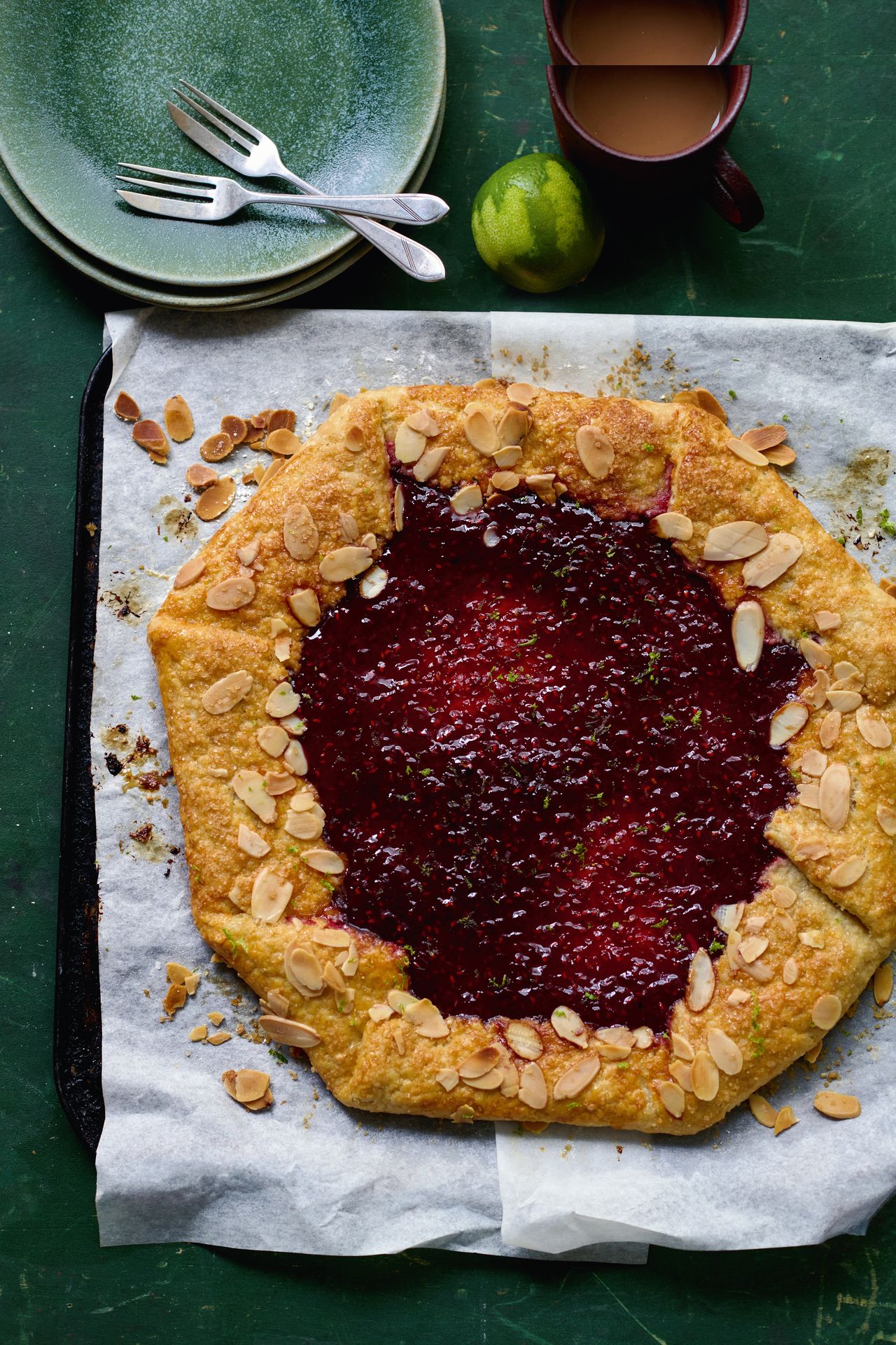 Image may contain Food Food Presentation Cutlery Fork Dessert Pastry Bread Plate Fruit Plant Produce and Cup