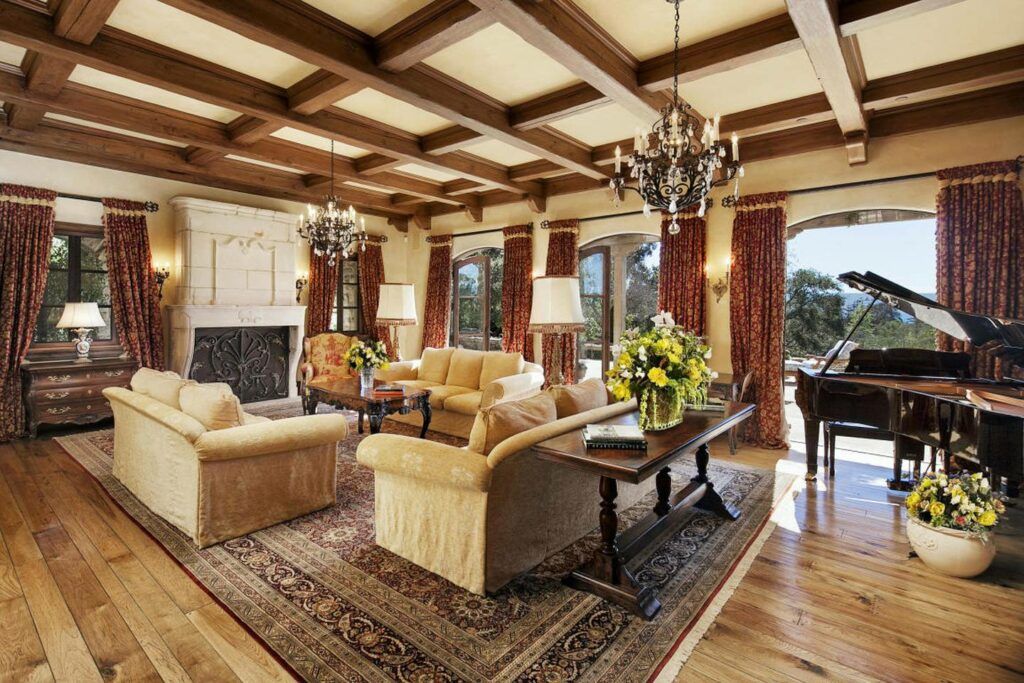 Inside Prince Harry and Meghan Markles Montecito Mansion at Risk From LA Wildfires living room with stone fireplace and...