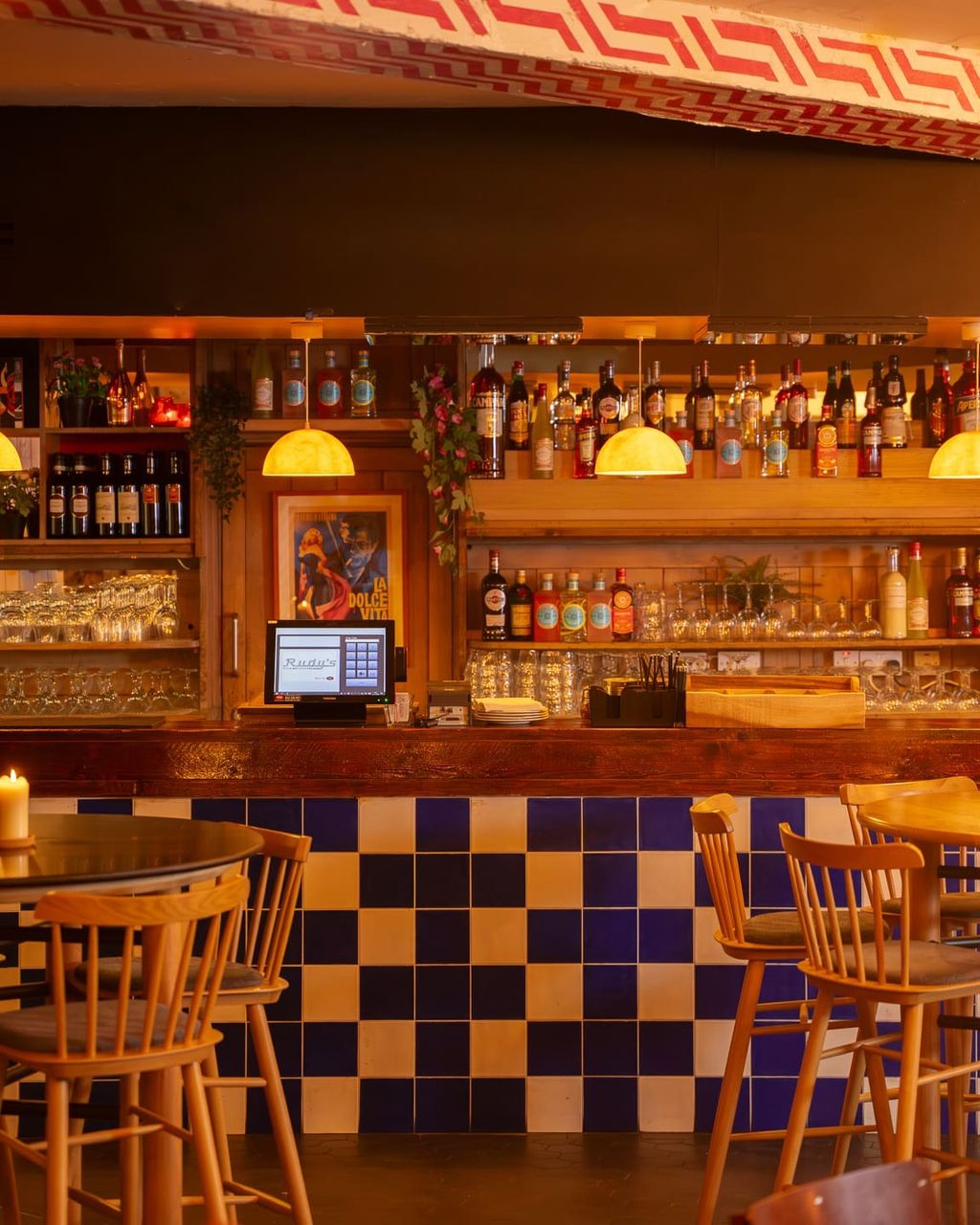 Image may contain Bar Candle Computer Hardware Electronics Hardware Monitor Screen Chair Furniture Lamp and Art