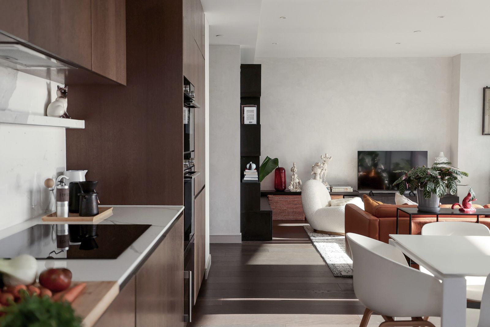 Image may contain Indoors Interior Design Plant Home Decor Dining Table Furniture Table Architecture and Building