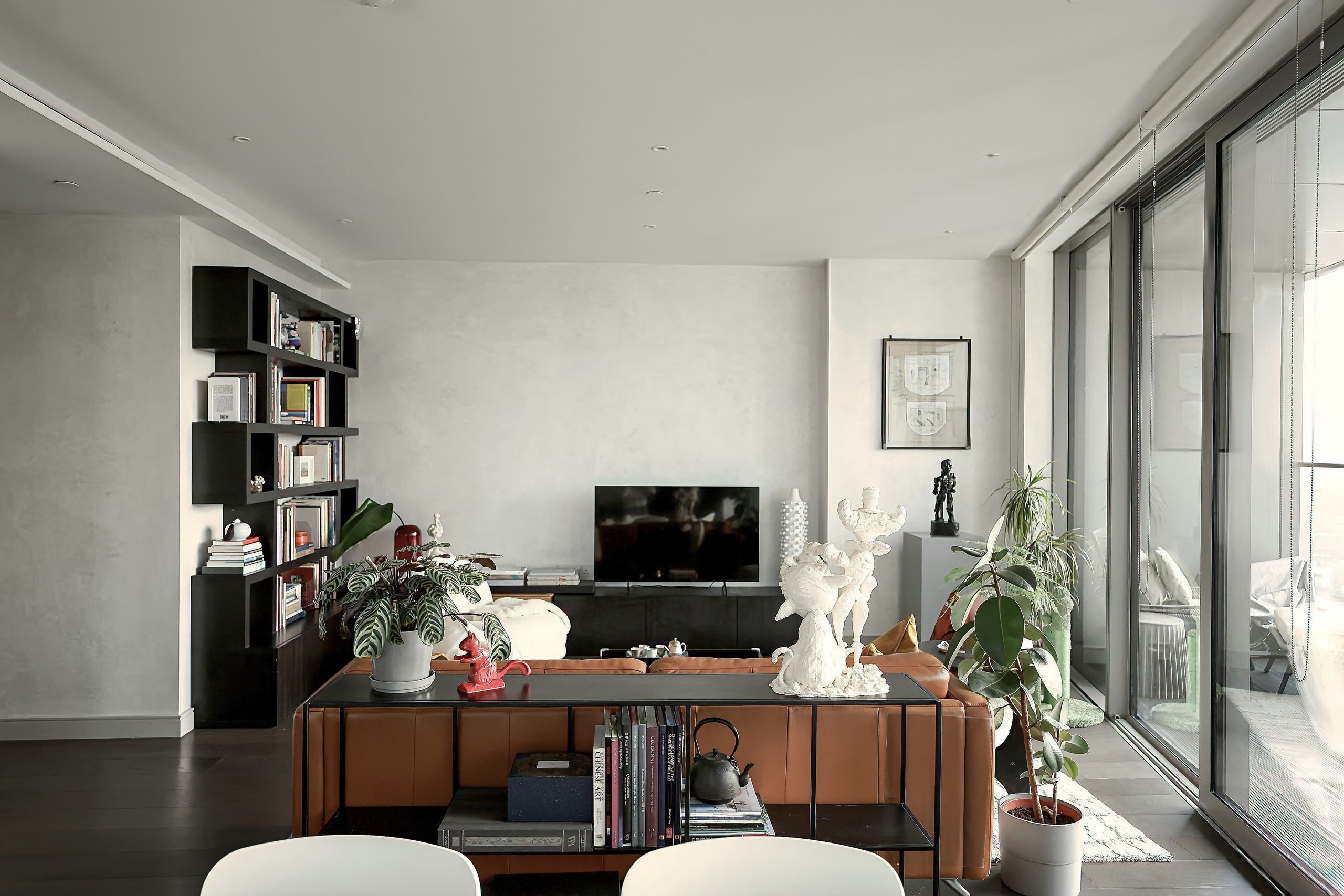 Image may contain: Architecture, Building, Furniture, Indoors, Living Room, Room, Plant, Interior Design, and Home Decor