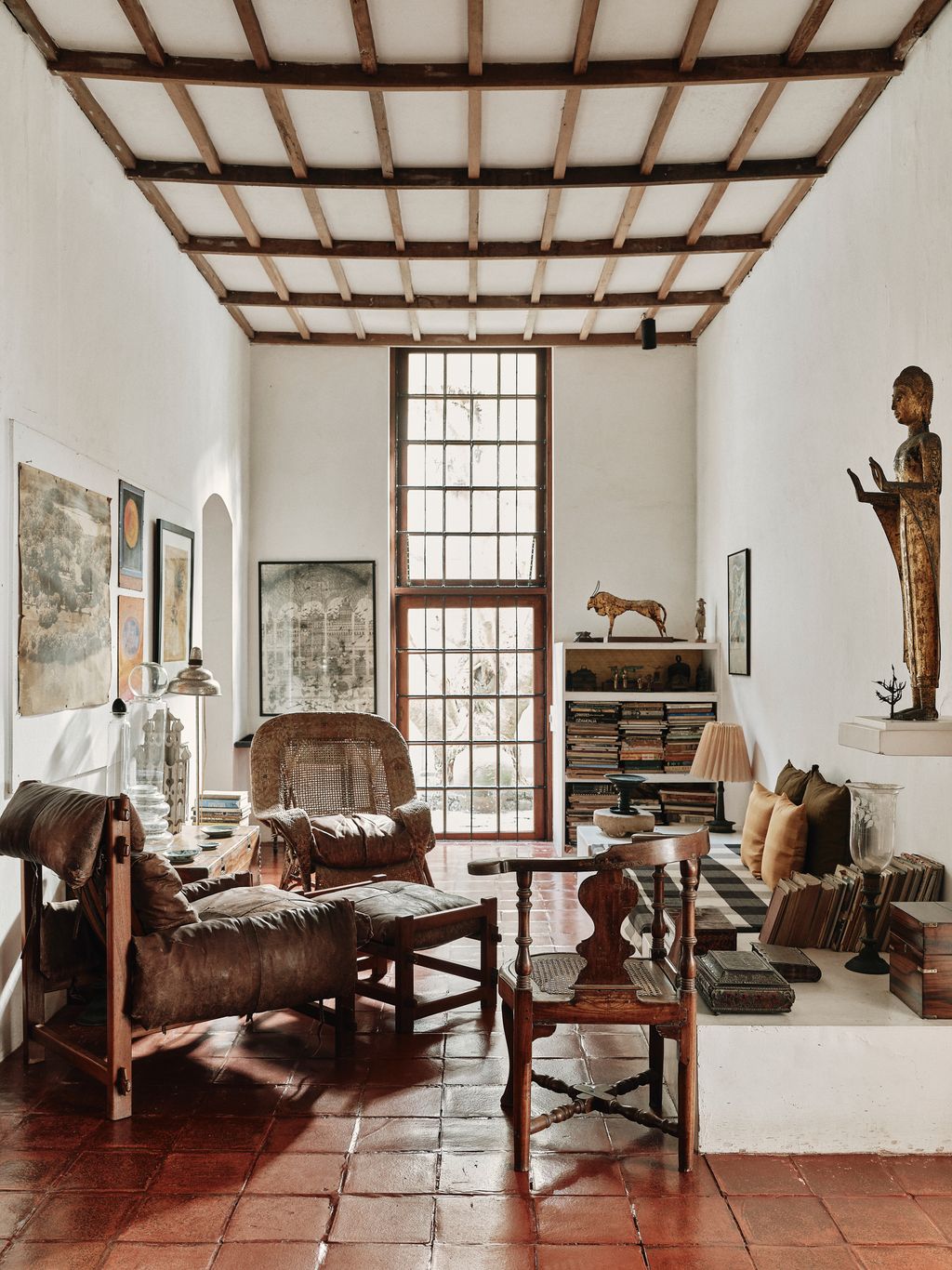 Image may contain Floor Chair Furniture Lamp Architecture Building Indoors Living Room Room and Home Decor