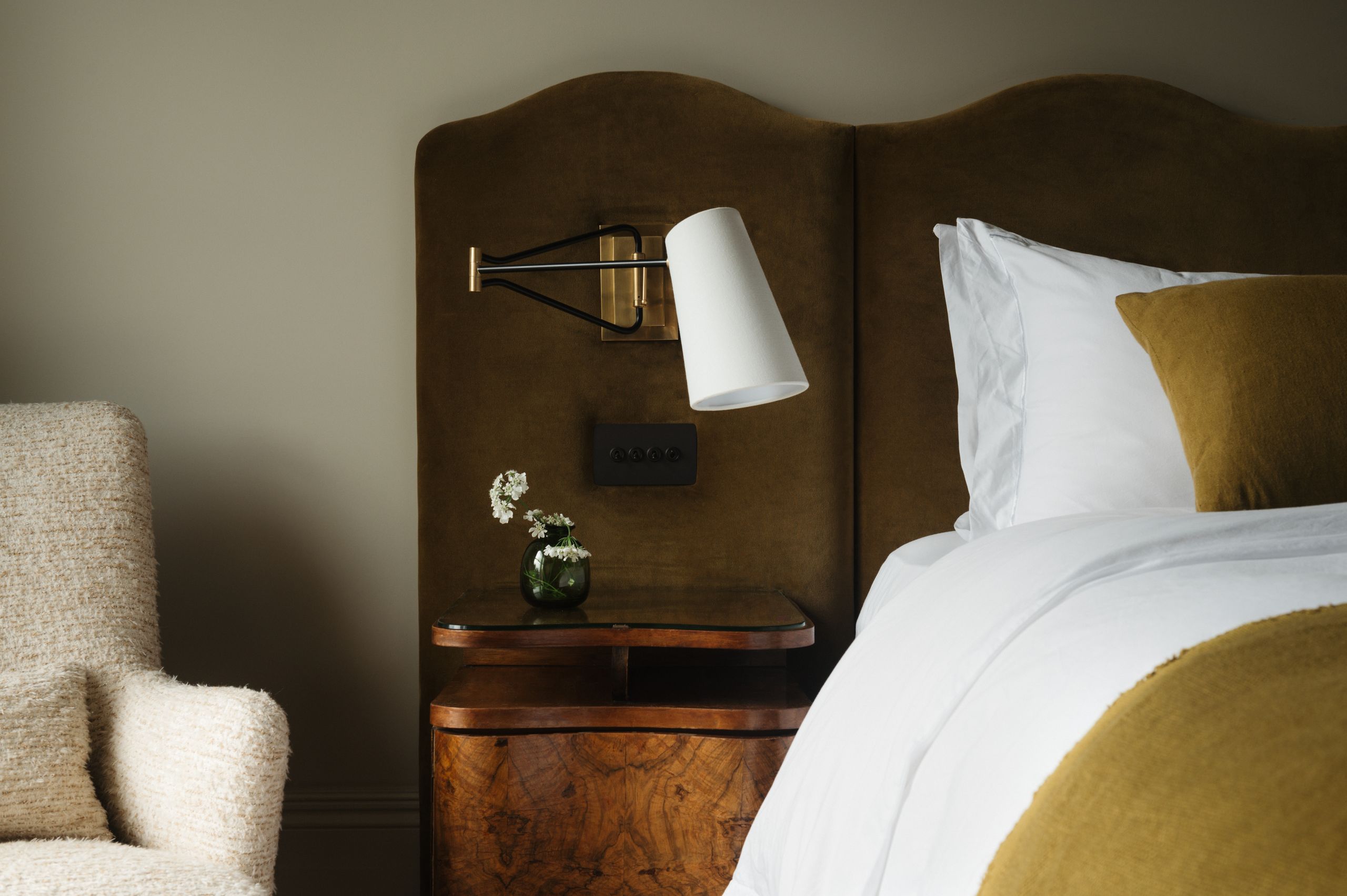 Image may contain: Lamp, Table Lamp, Cushion, Home Decor, Pillow, Bed, and Furniture