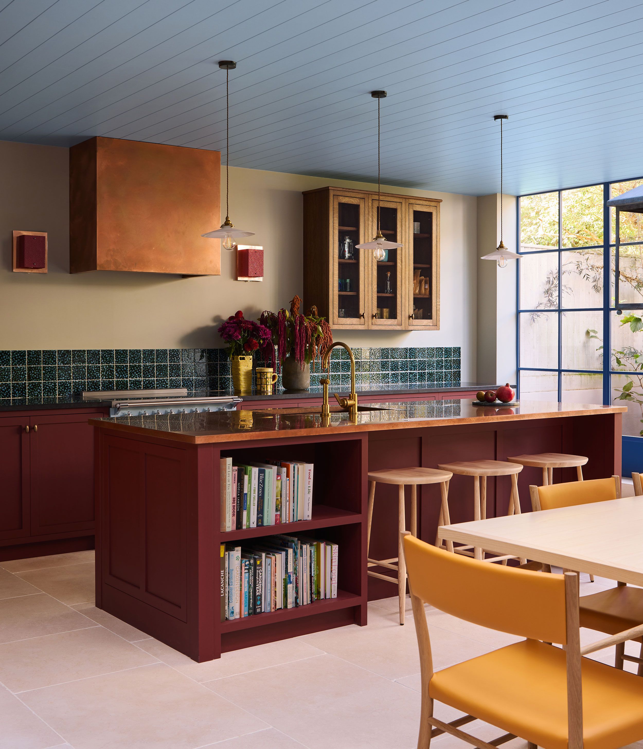 Image may contain: Indoors, Interior Design, Lamp, Kitchen, Sink, Sink Faucet, Chair, Furniture, and Kitchen Island