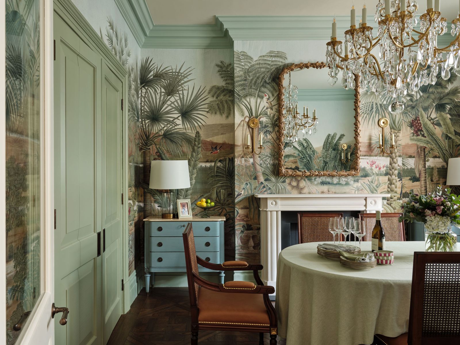 Image may contain Architecture Building Dining Room Dining Table Furniture Indoors Room Table Lamp and Chandelier