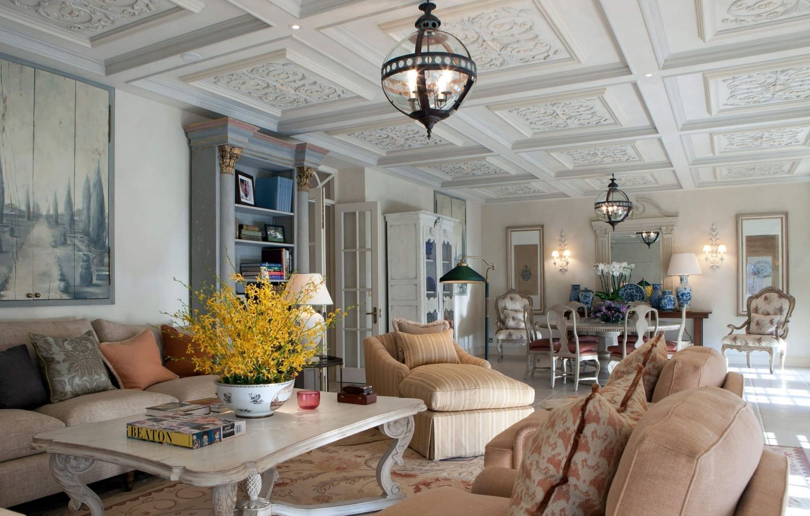 Image may contain Home Decor Lamp Architecture Building Dining Room Dining Table Furniture Indoors Room and Table