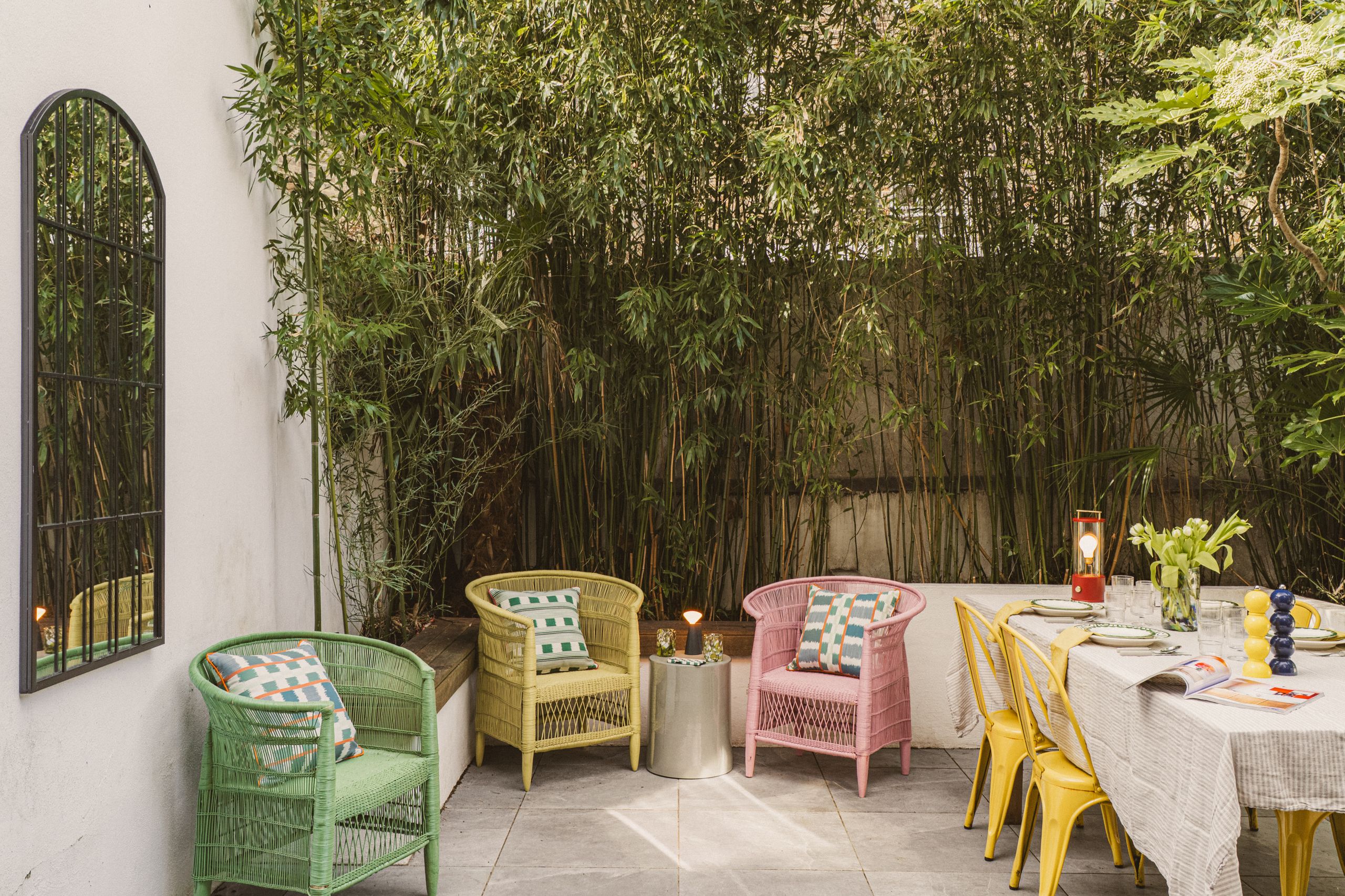 Image may contain: Chair, Furniture, Architecture, Building, Hotel, Resort, Table, Dining Table, Plate, and Candle