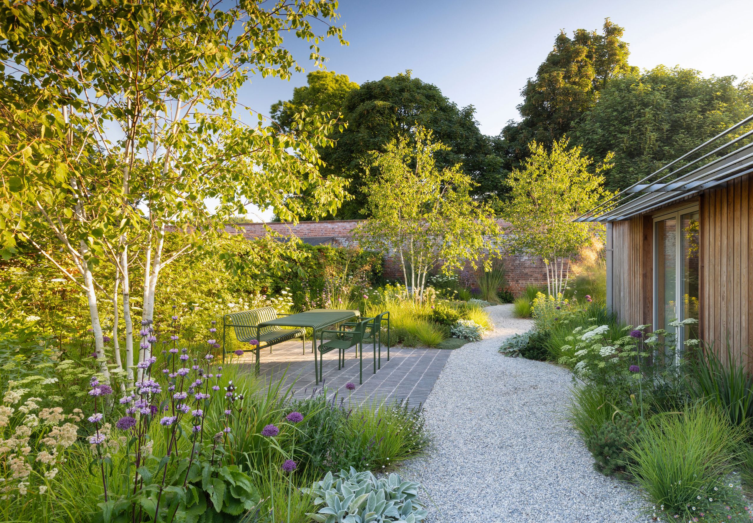 Image may contain: Backyard, Nature, Outdoors, Yard, Garden, Grass, Plant, Vegetation, Architecture, Building, and Housing