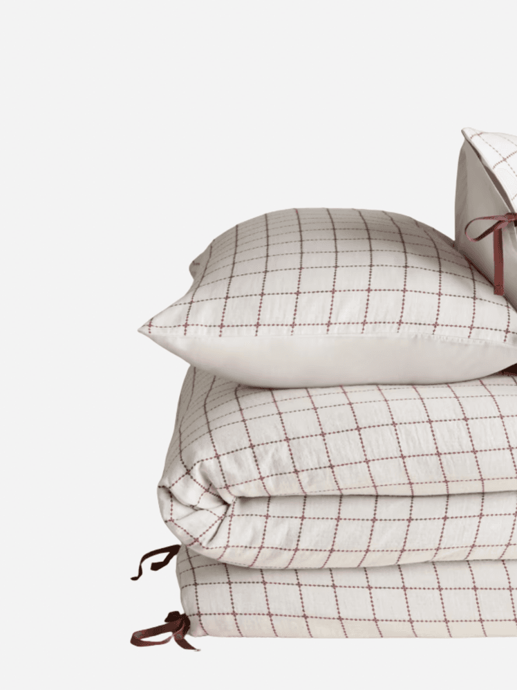 Image may contain: Cushion, Home Decor, Linen, Pillow, Bag, Accessories, and Handbag