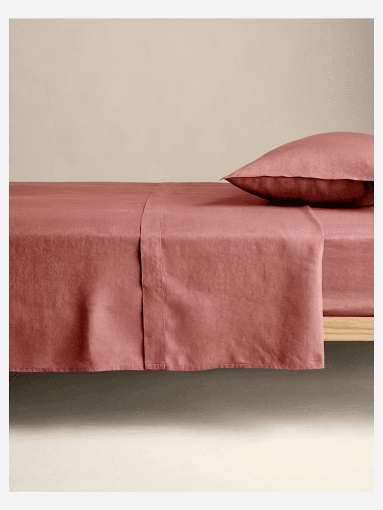 Image may contain: Home Decor, Furniture, Bed, Cushion, and Bed Sheet