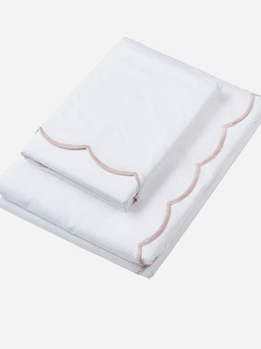 Image may contain Blanket and Napkin