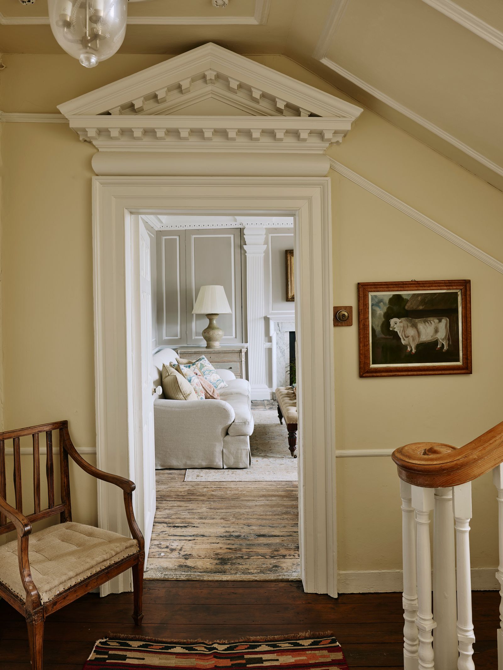 Image may contain Indoors Interior Design Lamp Home Decor Rug Chair Furniture Architecture Building and House