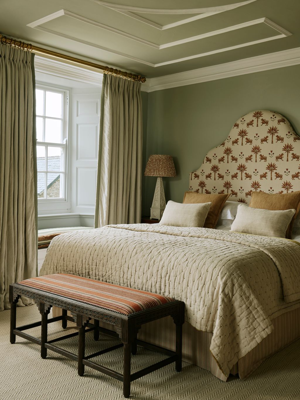 Image may contain Indoors Interior Design Lamp Bed Furniture Bench Home Decor Bedroom Room and Cushion