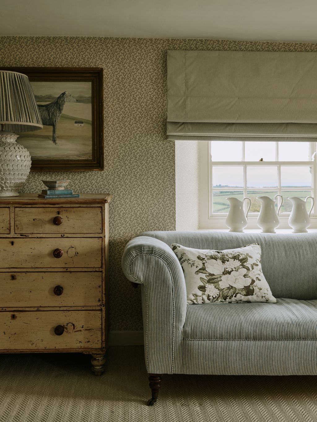 Image may contain Lamp Indoors Interior Design Furniture Couch Home Decor Art Painting Architecture and Building