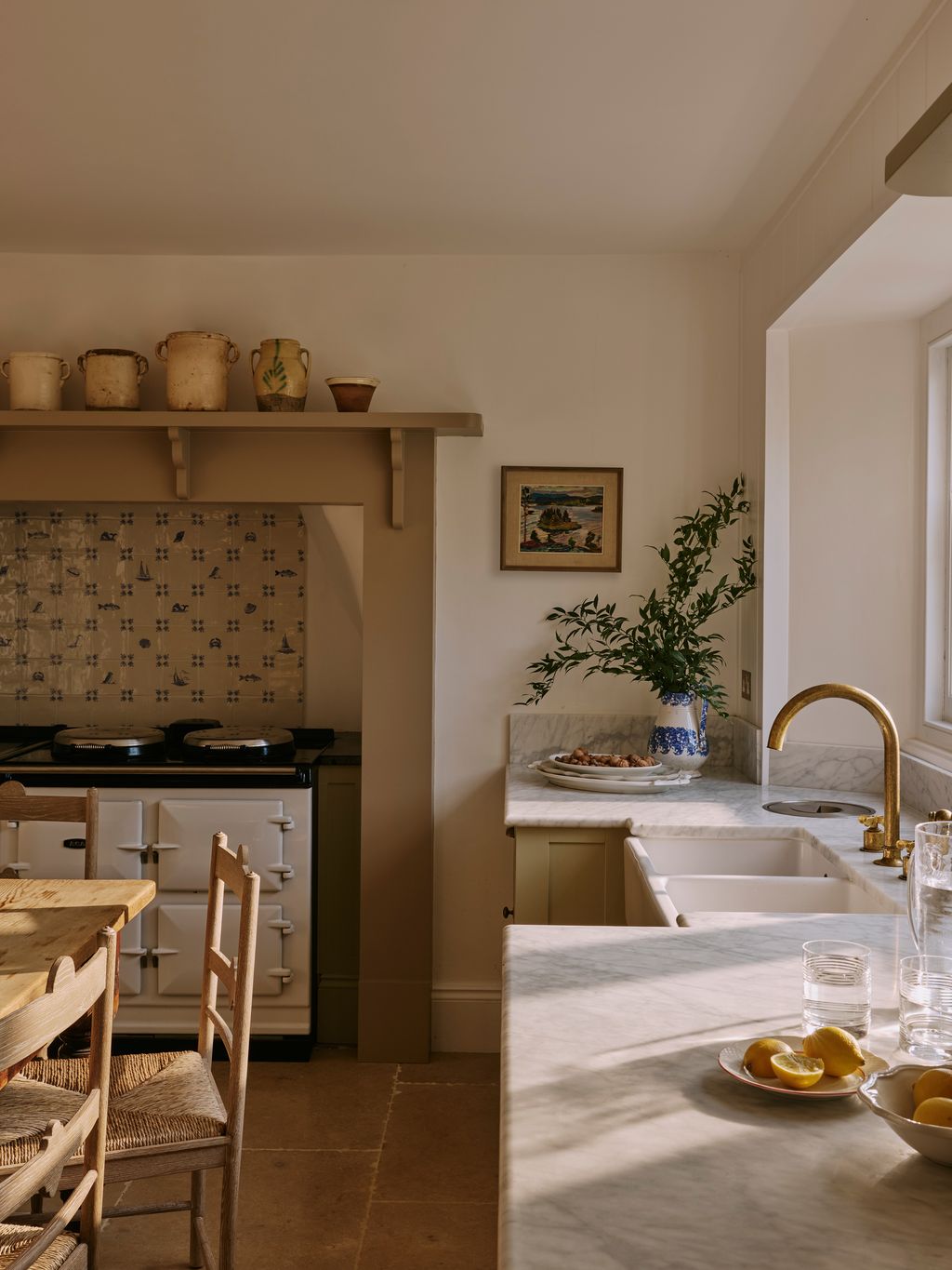 Image may contain Indoors Interior Design Architecture Building Dining Room Dining Table Furniture Room and Table