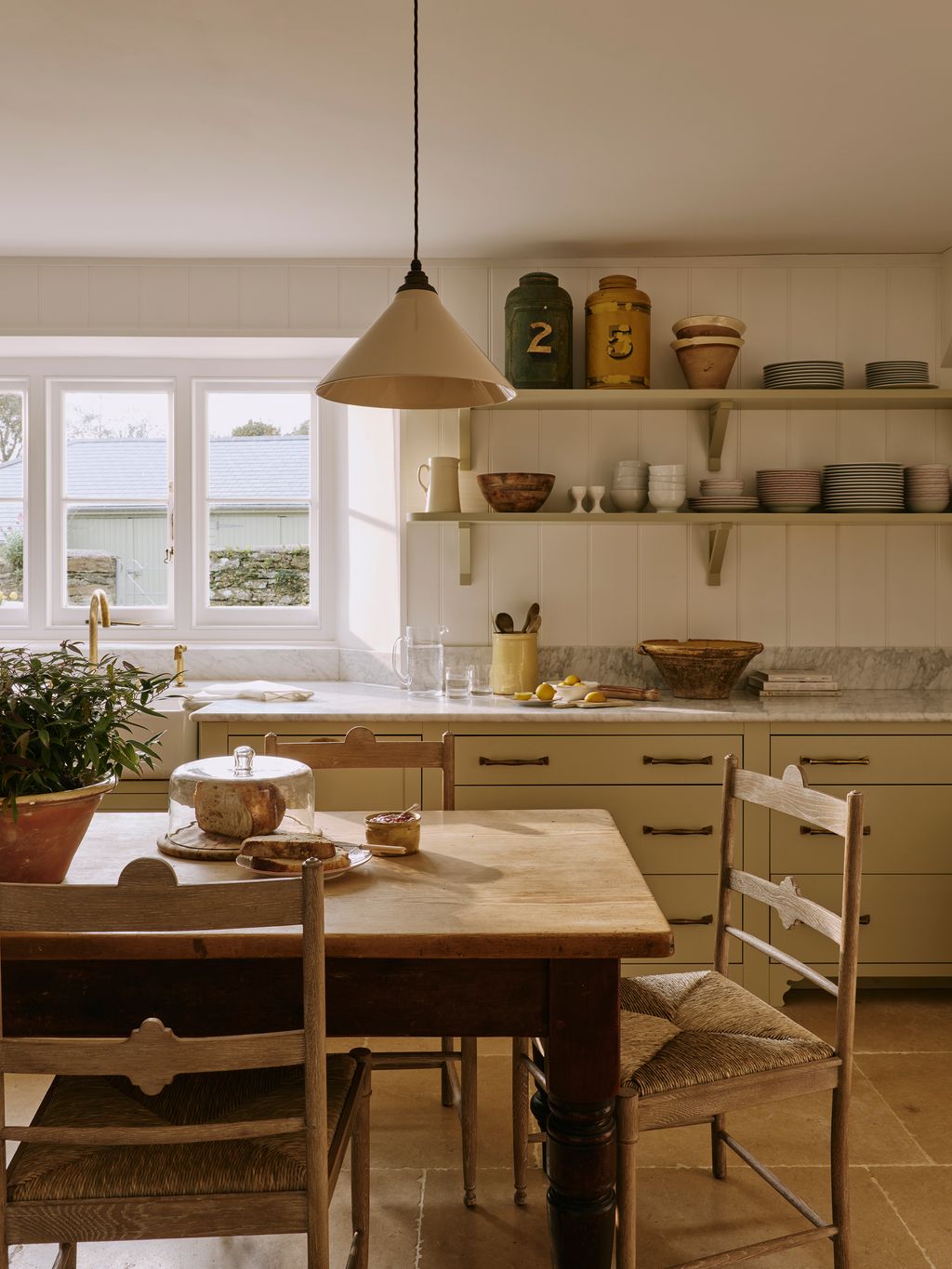 Image may contain Architecture Building Dining Room Dining Table Furniture Indoors Room Table and Interior Design