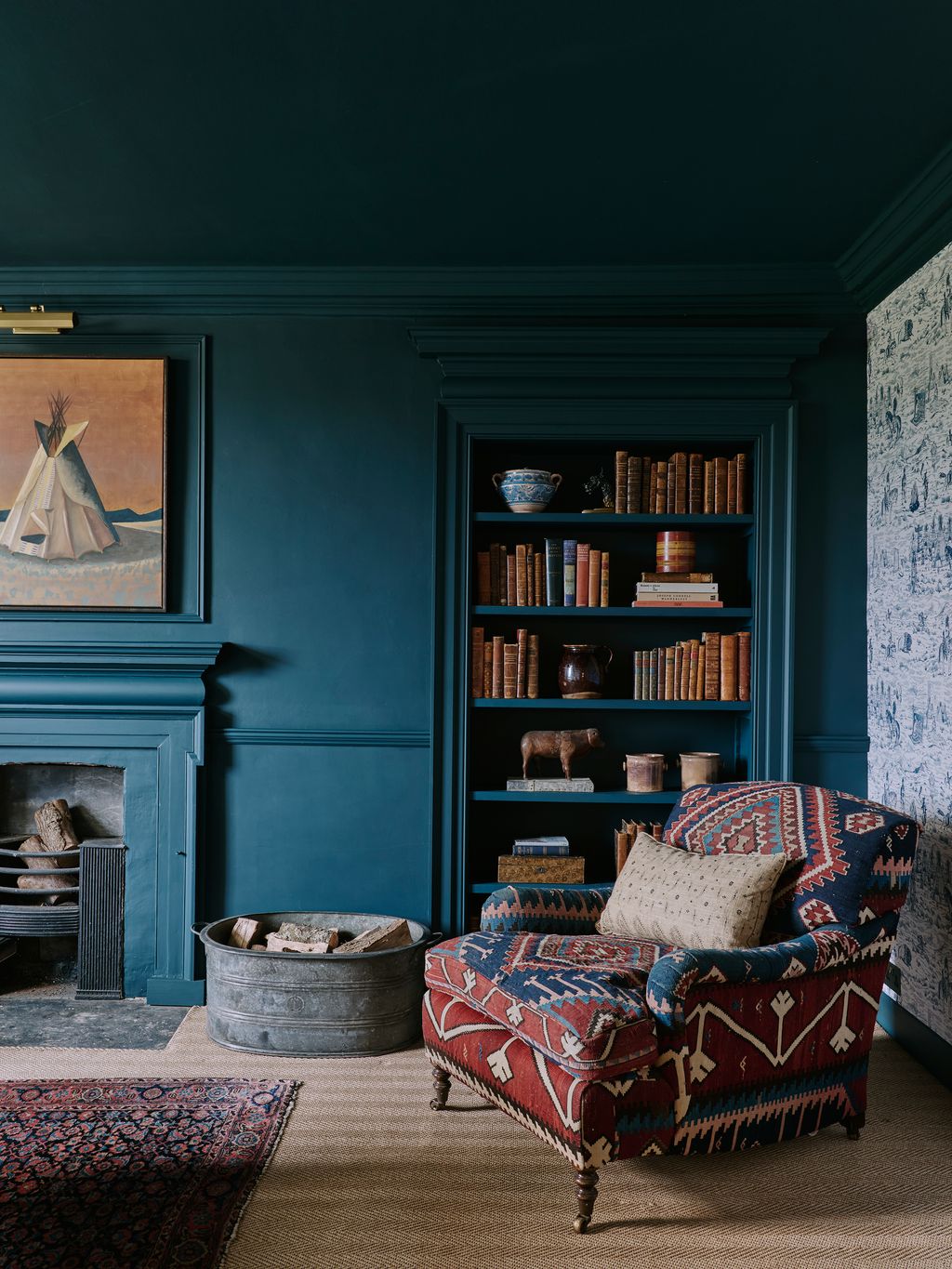 Image may contain Furniture Couch Art Painting Home Decor Box Rug and Bookcase