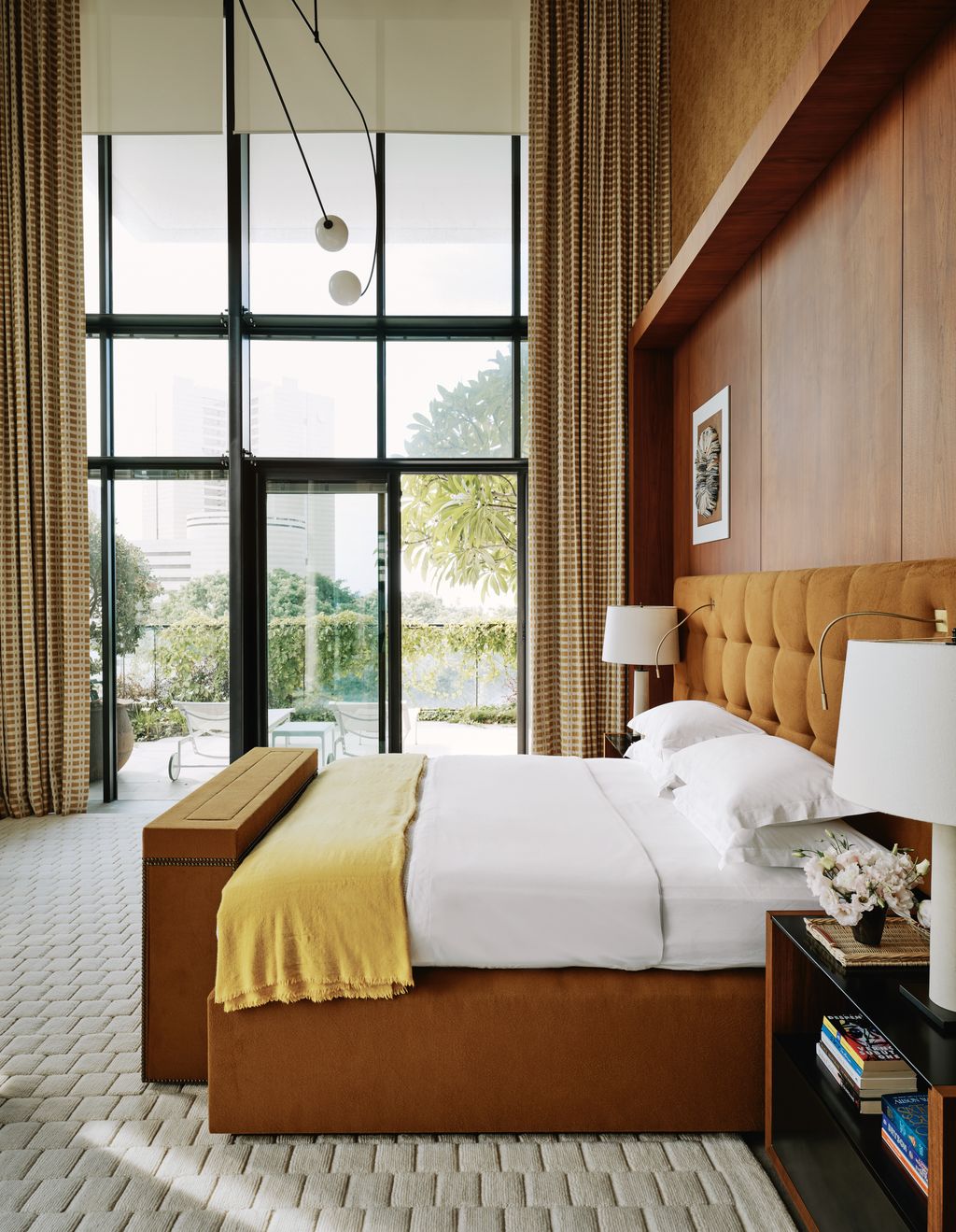 Image may contain Indoors Interior Design Lamp Bed Furniture Art Painting Home Decor Chair Table Lamp and Bedroom