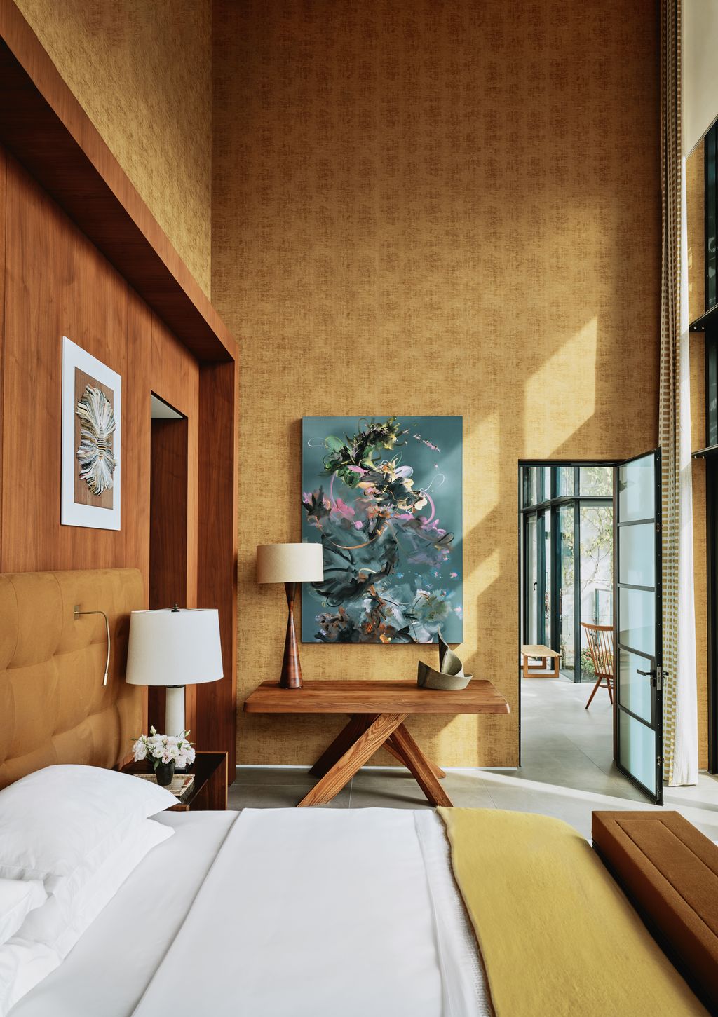 Image may contain Indoors Interior Design Corner Lamp Chair Furniture Table Lamp Desk Table Bed Bench and Art