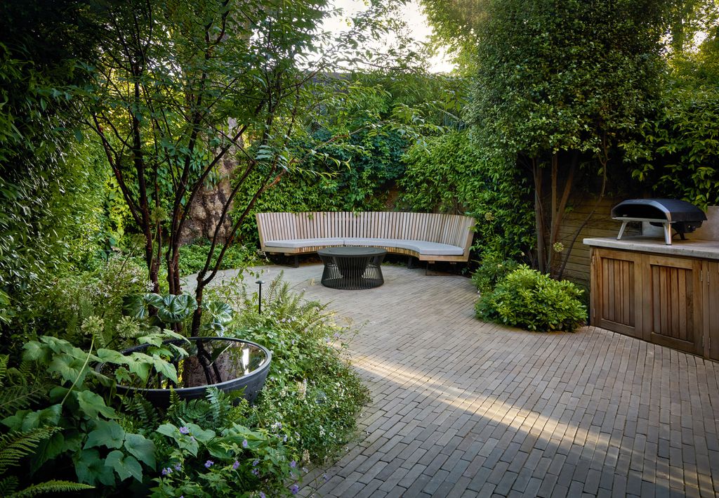 Image may contain Backyard Nature Outdoors Yard Garden Indoors Interior Design Bench Furniture Desk and Table