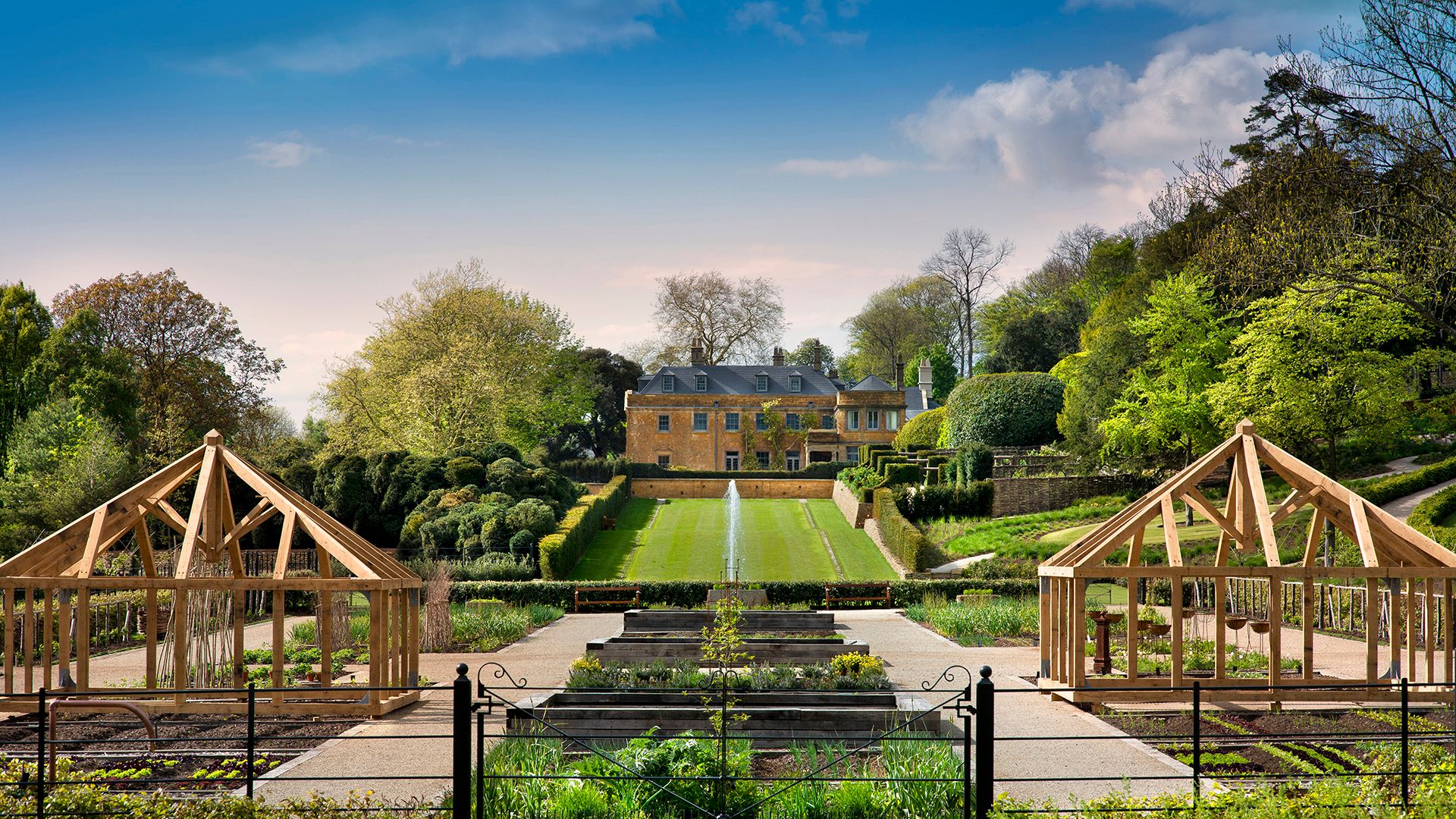 Image may contain: Architecture, Building, Housing, House, Manor, Outdoors, Garden, Nature, Grass, and Plant