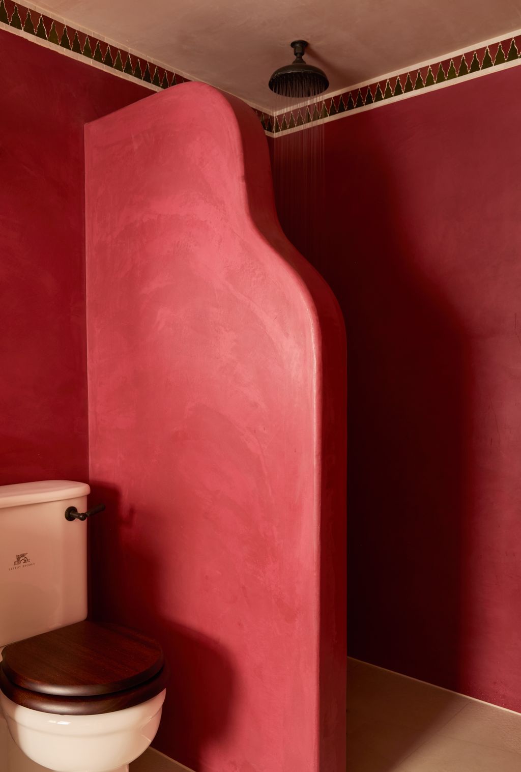 Image may contain Corner Indoors Interior Design Architecture Building Wall Bathroom Room and Toilet