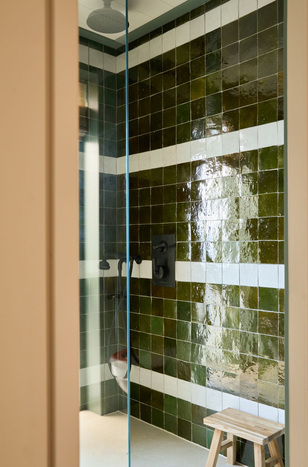 Image may contain Indoors Interior Design Bench Furniture Bathroom Room and Lamp