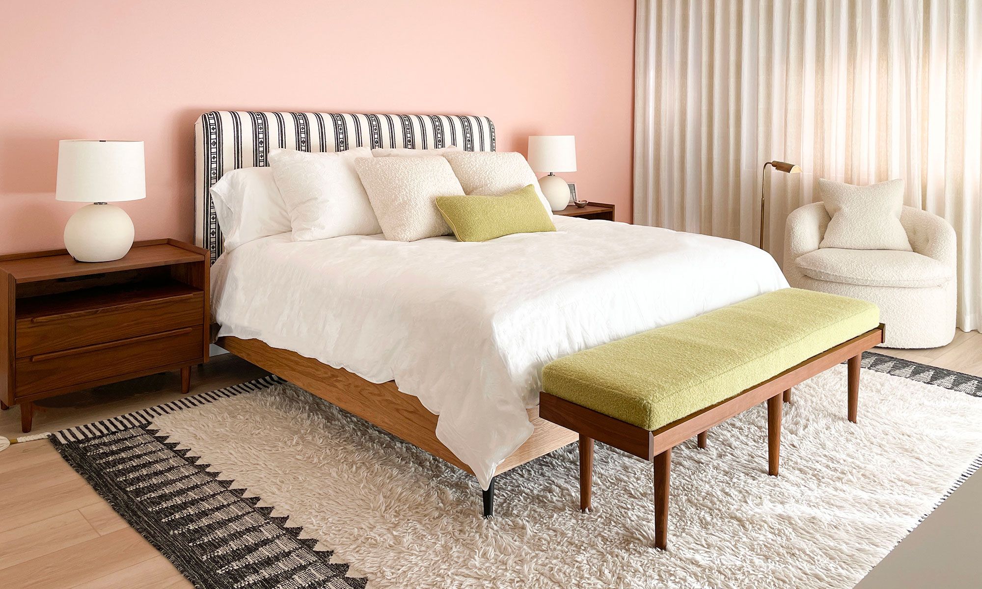 Image may contain: Home Decor, Lamp, Rug, Bed, Furniture, Bench, Indoors, Interior Design, Cushion, Couch, Bedroom, and Room