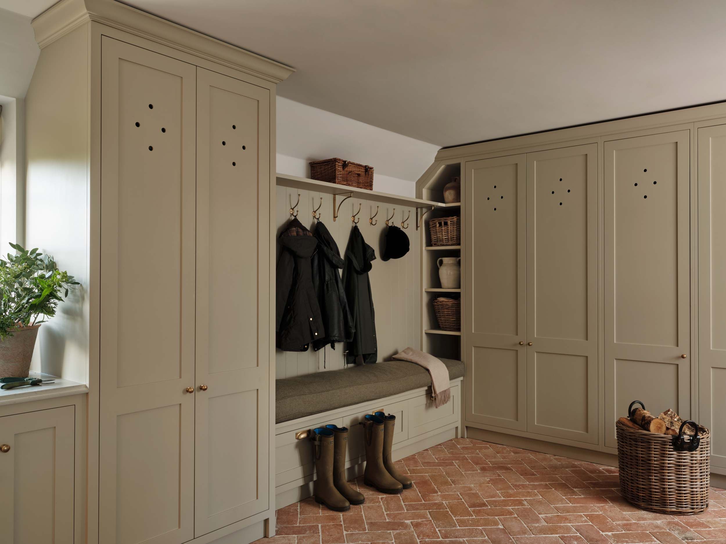 Image may contain: Plant, Indoors, Interior Design, Dressing Room, Room, Furniture, Closet, Clothing, Footwear, and Shoe