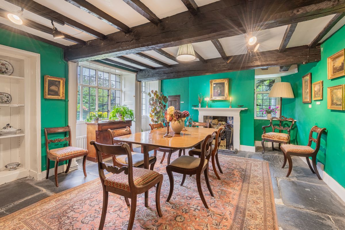 Image may contain Architecture Building Dining Room Dining Table Furniture Indoors Room Table Home Decor and Chair