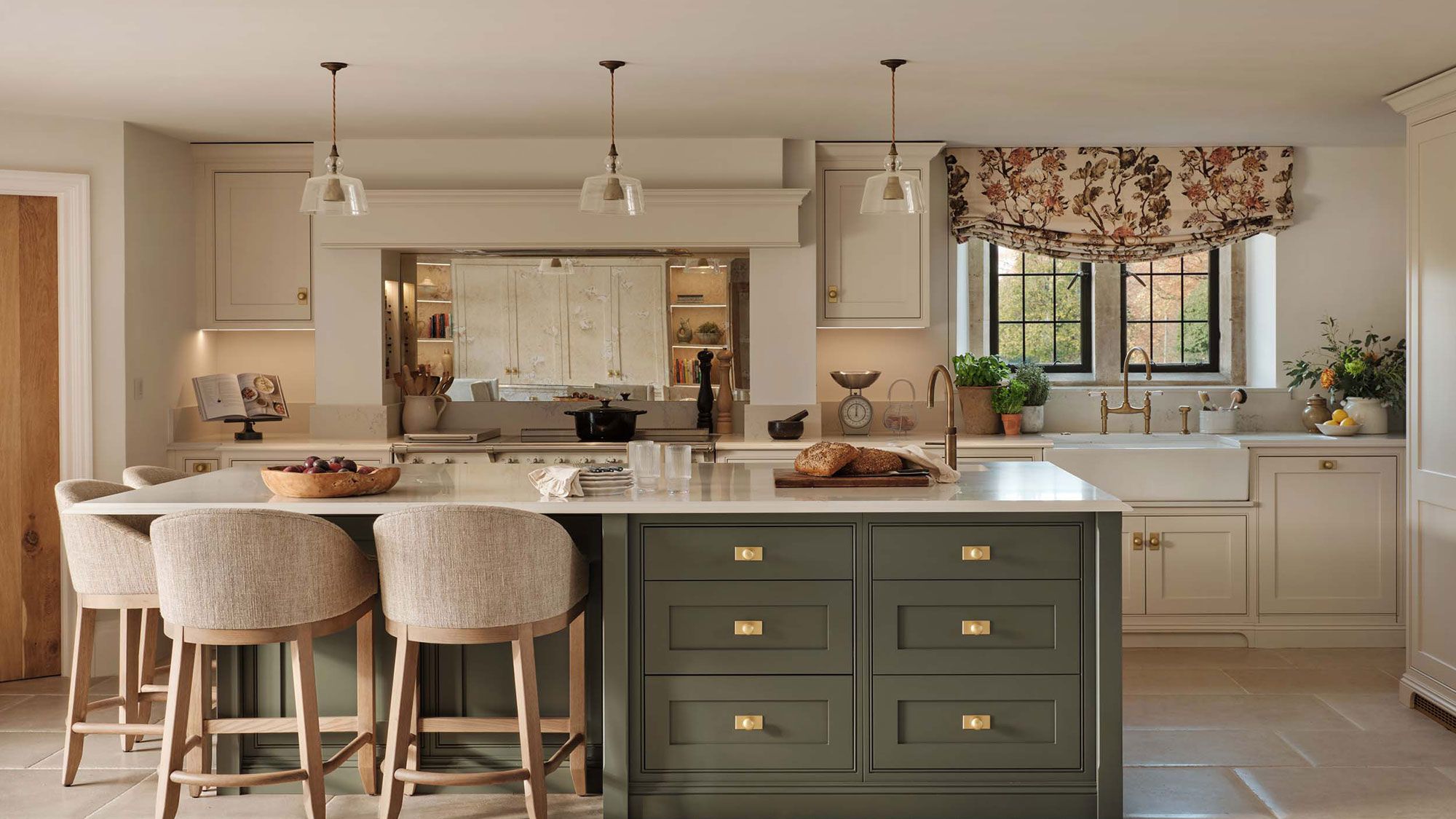 Image may contain: Indoors, Interior Design, Kitchen, Kitchen Island, Book, Publication, Sink, and Home Decor