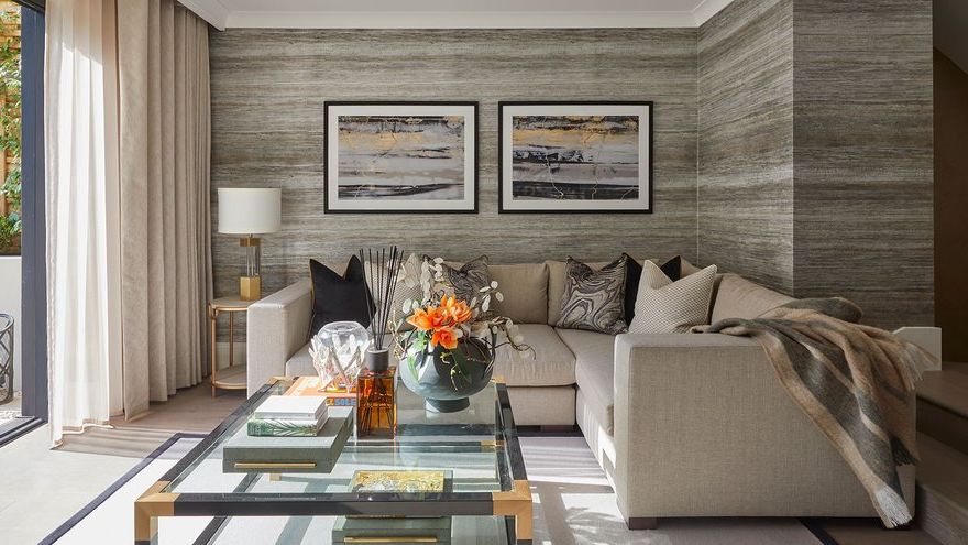 Image may contain: Indoors, Interior Design, Home Decor, Lamp, Couch, Furniture, Table, Architecture, and Building