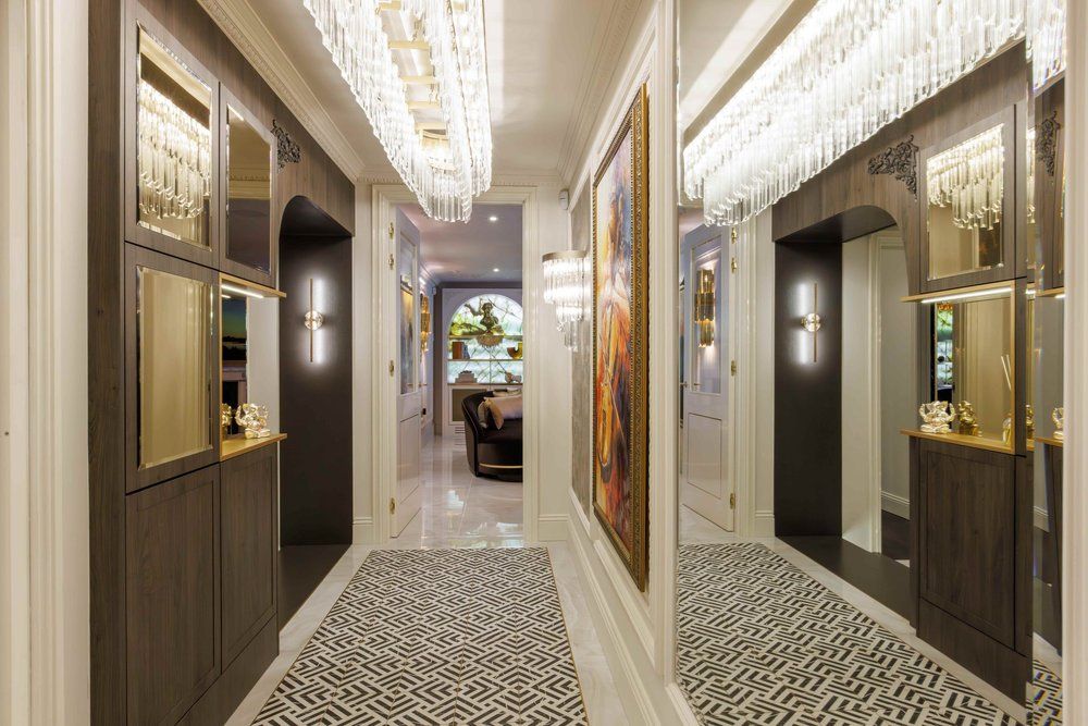 Image may contain: Indoors, Lamp, Home Decor, Rug, Couch, Furniture, Art, Painting, Interior Design, and Floor